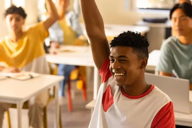 A student smiling and feeling confident