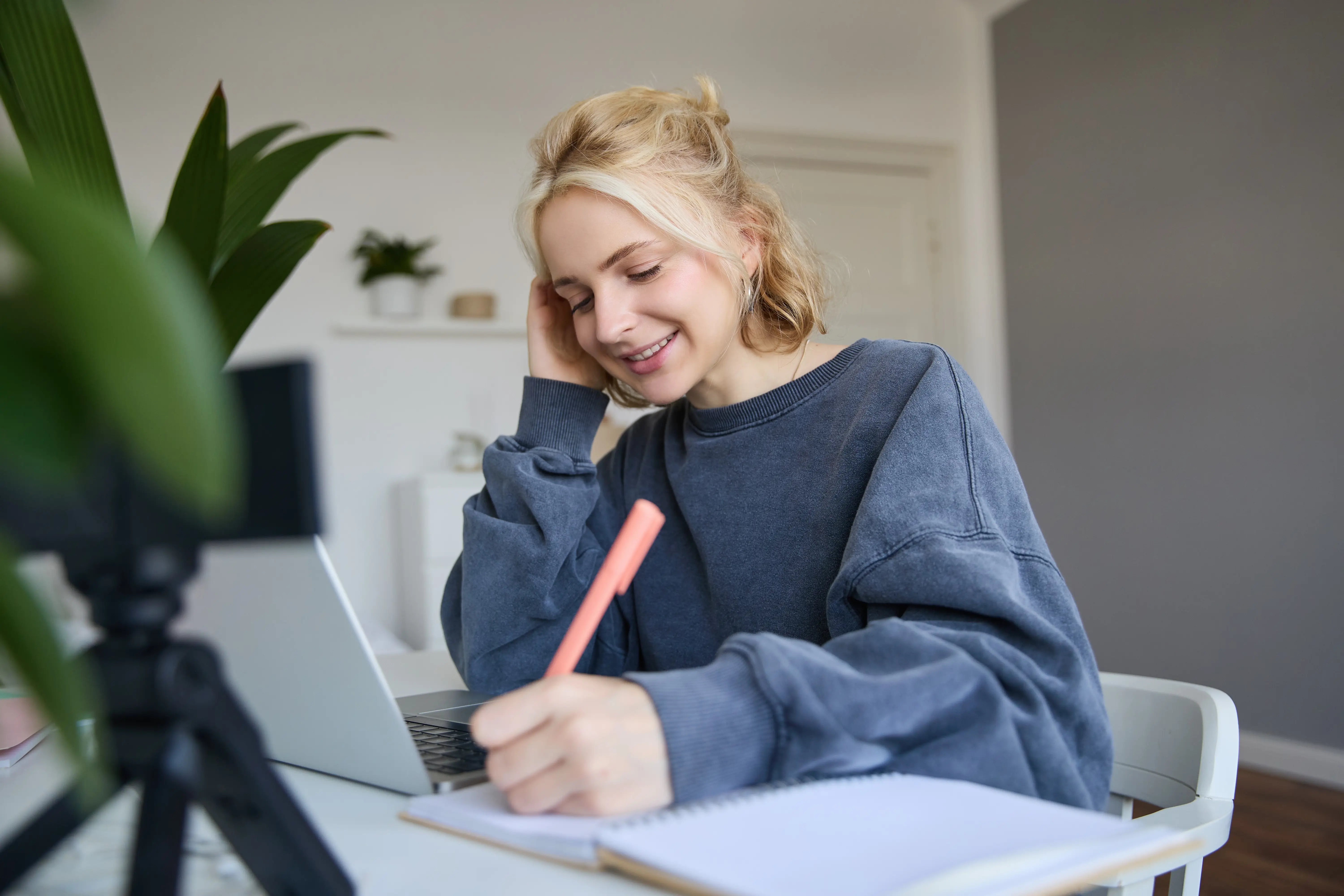 A student and tutor celebrating a success