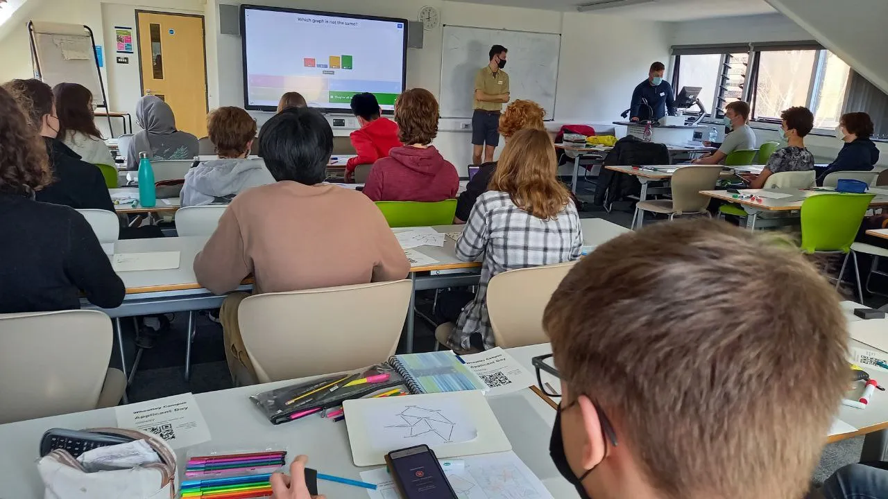 Close-up of a complex maths equation on a whiteboard